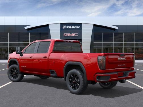 Volcanic Red Tintcoat 2026 GMC Sierra 3500 AT4