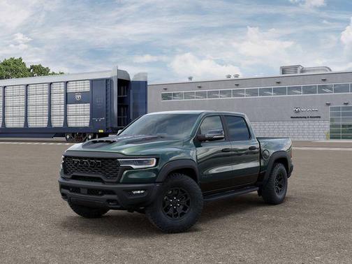 Serrano Green Metallic 2026 RAM 1500 RHO Crew Cab 4x4 5'7' Box