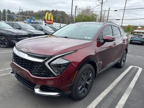 Red 2023 Kia Sportage Hybrid SX-Prestige