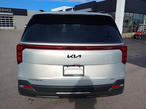 Ivory Silver 2026 Kia Carnival Hybrid SX
