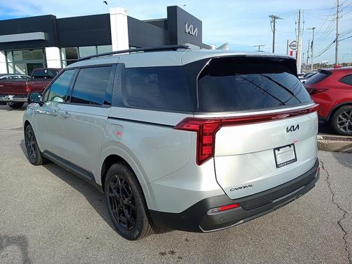Ivory Silver 2026 Kia Carnival Hybrid SX