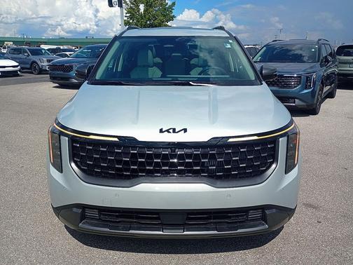 Ivory Silver 2026 Kia Carnival Hybrid SX