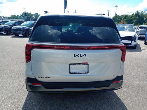 Ivory Silver 2026 Kia Carnival Hybrid SX