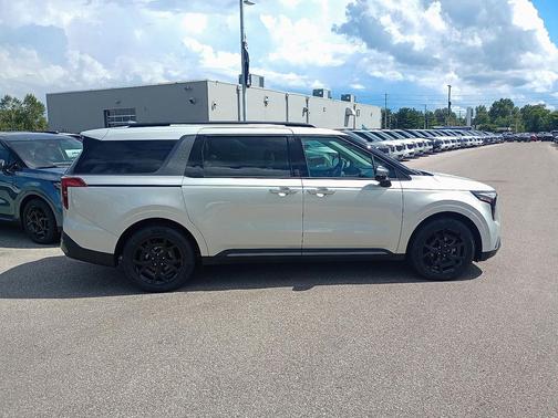 Ivory Silver 2026 Kia Carnival Hybrid SX