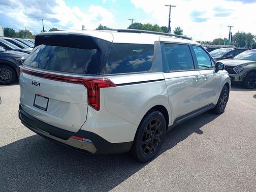 Ivory Silver 2026 Kia Carnival Hybrid SX