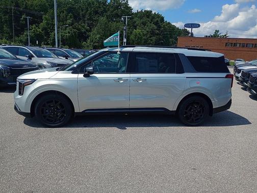 Ivory Silver 2026 Kia Carnival Hybrid SX