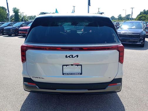 Ivory Silver 2026 Kia Carnival Hybrid SX
