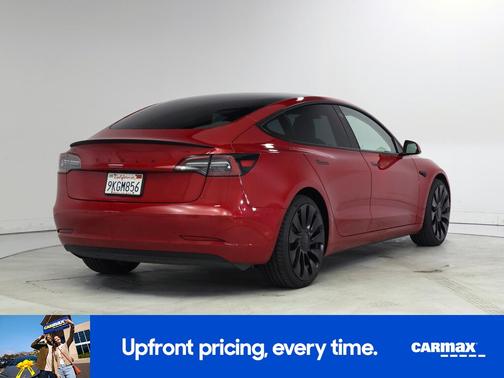 Red 2023 Tesla Model 3
