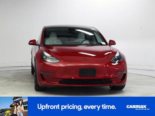 Red 2023 Tesla Model 3