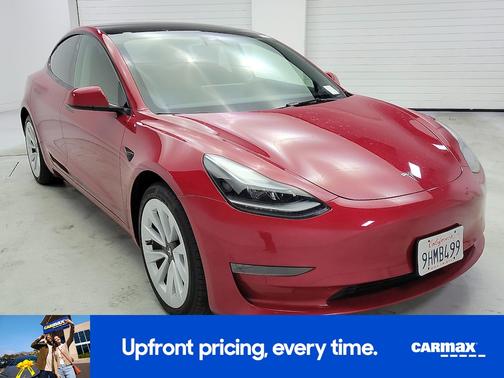 Red 2023 Tesla Model 3