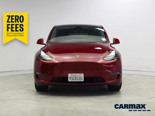 Red 2025 Tesla Model Y Long Range