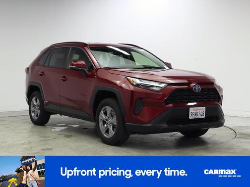 Red 2023 Toyota RAV4 Hybrid LE