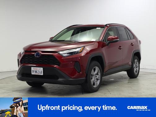Red 2023 Toyota RAV4 Hybrid LE