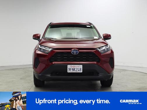 Red 2023 Toyota RAV4 Hybrid LE