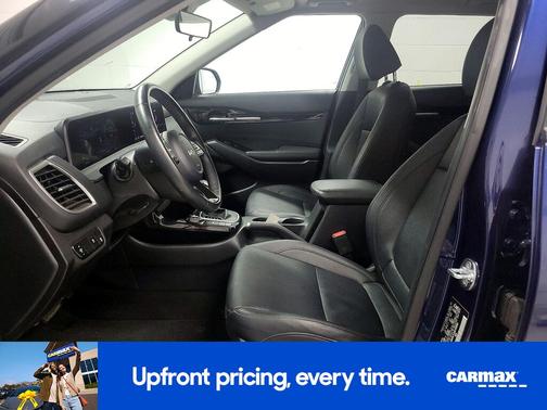 Blue 2024 Kia Seltos EX