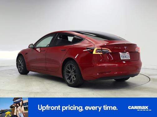 Red 2023 Tesla Model 3