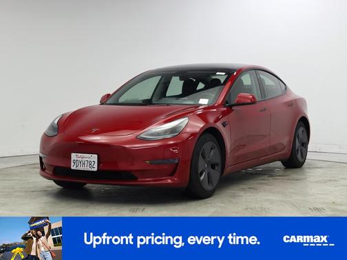 Red 2023 Tesla Model 3