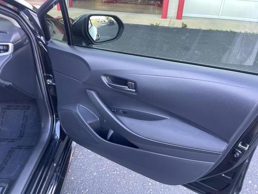Midnight Black Metallic 2024 Toyota Corolla Hybrid LE