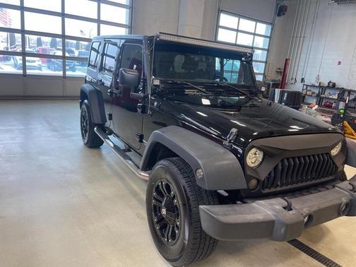 Photo 2 of 31 of 2016 Jeep Wrangler Unlimited Sport