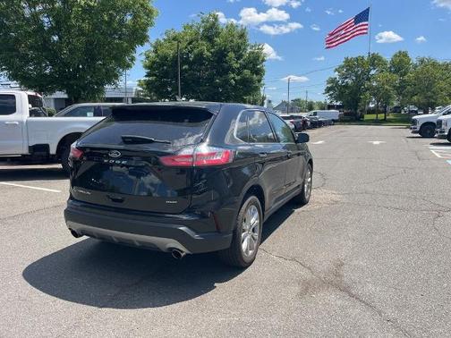 AGATE BLACK METALLIC 2024 Ford Edge TITANIUM