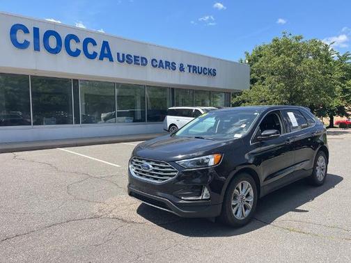 AGATE BLACK METALLIC 2024 Ford Edge TITANIUM