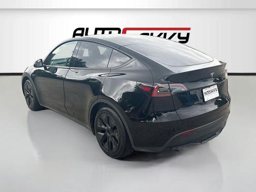 Solid Black 2025 Tesla Model Y Long Range Dual Motor Rear-Wheel Drive