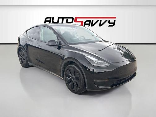 Solid Black 2025 Tesla Model Y Long Range Dual Motor Rear-Wheel Drive