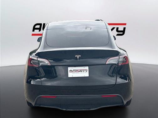 Solid Black 2025 Tesla Model Y Long Range Dual Motor Rear-Wheel Drive