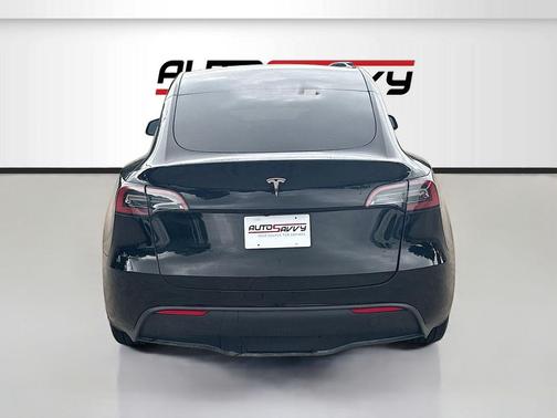Solid Black 2025 Tesla Model Y Long Range Dual Motor Rear-Wheel Drive