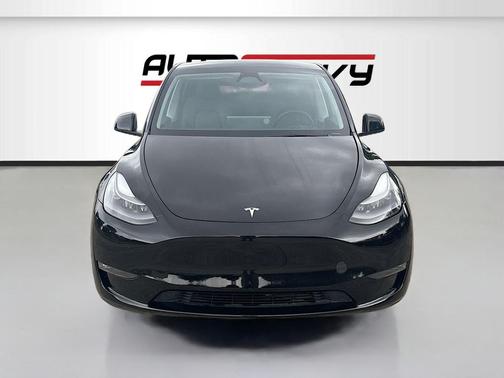 Solid Black 2025 Tesla Model Y Long Range Dual Motor Rear-Wheel Drive