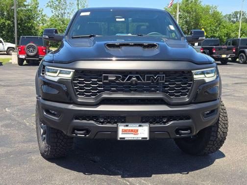 Diamond Black Crystal Pearlcoat 2026 RAM 1500 RHO Crew Cab 4x4 5'7' Box