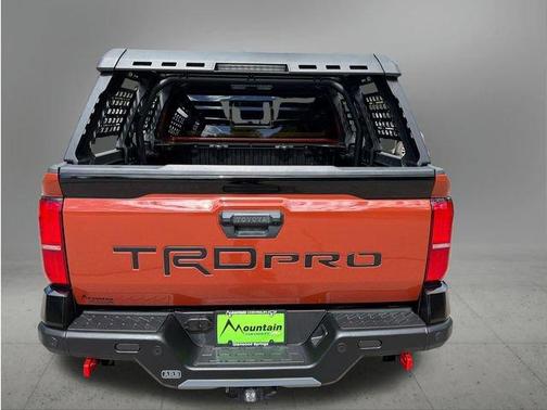 Orange 2024 Toyota Tacoma Hybrid TRD PRO
