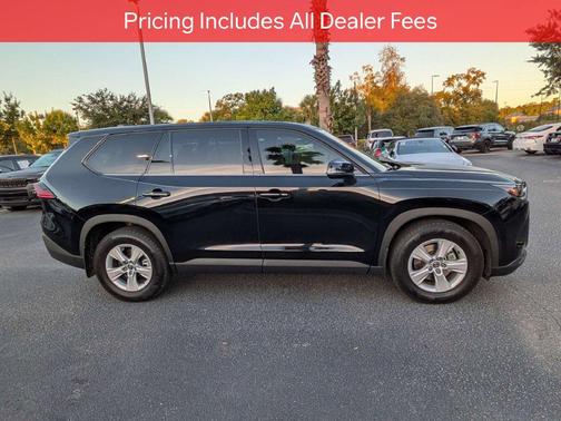 Midnight Black Metallic 2026 Toyota Highlander LE