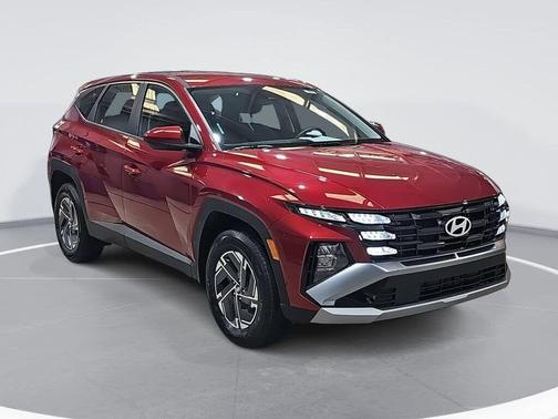 Red 2026 Hyundai TUCSON Hybrid Blue SE