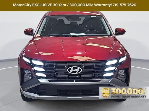 Red 2026 Hyundai TUCSON Hybrid Blue SE