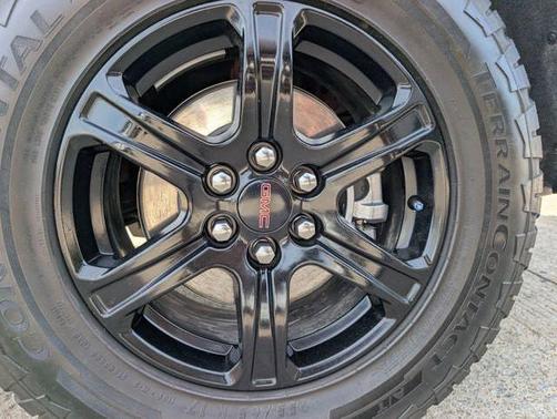 Volcanic Red Tintcoat 2023 GMC Acadia AWD AT4