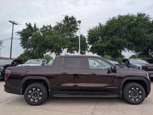 Dark Ember Metallic 2026 GMC Sierra EV Extended Range Elevation
