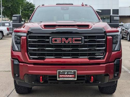 Volcanic Red Tintcoat 2025 GMC Sierra 2500 AT4
