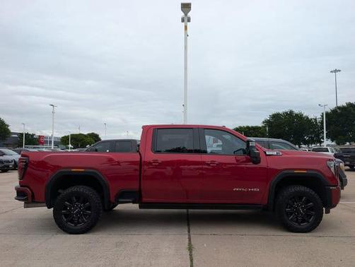 Volcanic Red Tintcoat 2025 GMC Sierra 2500 AT4