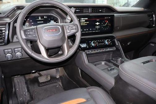 Volcanic Red Tintcoat 2025 GMC Sierra 2500 AT4