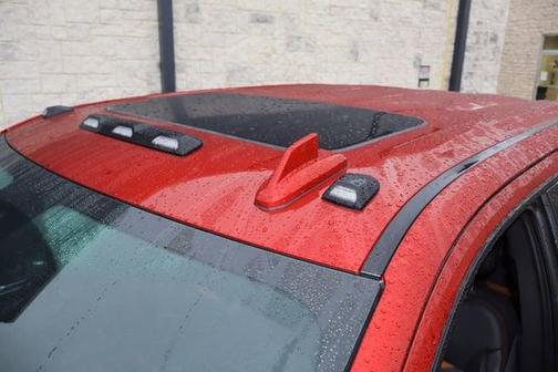 Volcanic Red Tintcoat 2025 GMC Sierra 2500 AT4