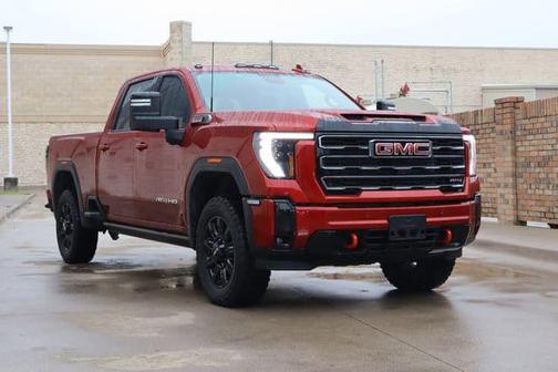 Volcanic Red Tintcoat 2025 GMC Sierra 2500 AT4
