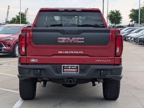 Volcanic Red Tintcoat 2026 GMC Sierra 1500 AT4X