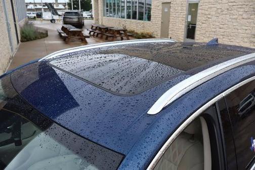 Sapphire Metallic 2023 Buick Envision Avenir FWD