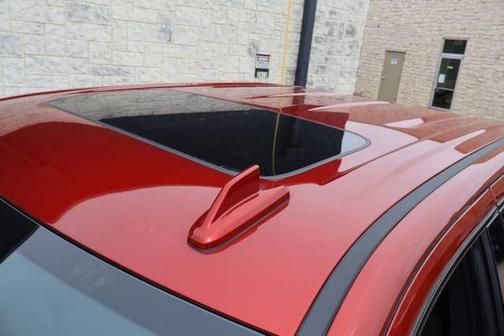 Volcanic Red Tintcoat 2023 GMC Sierra 1500 AT4