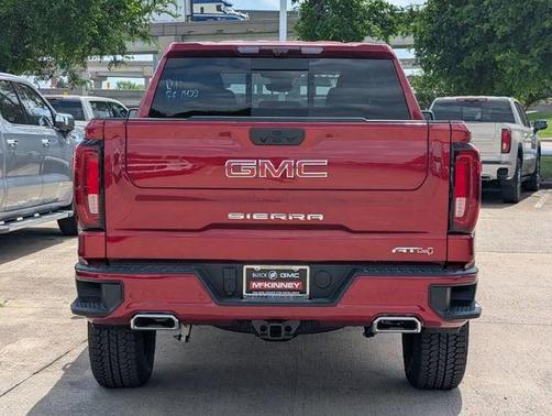 Volcanic Red Tintcoat 2026 GMC Sierra 1500 AT4