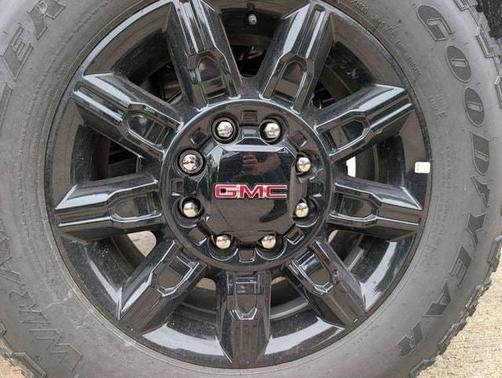 Volcanic Red Tintcoat 2026 GMC Sierra 2500 AT4