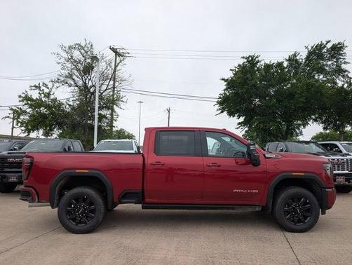 Volcanic Red Tintcoat 2026 GMC Sierra 2500 AT4