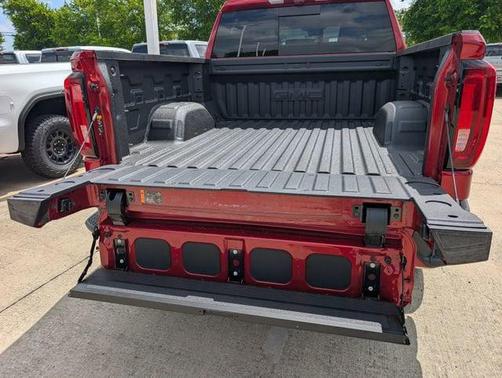 Volcanic Red Tintcoat 2026 GMC Sierra 1500 AT4