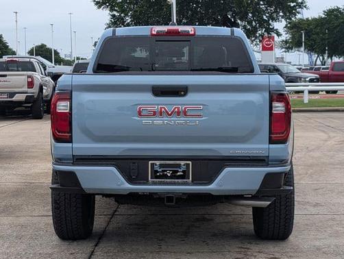 Glacier Metallic 2026 GMC Canyon Denali